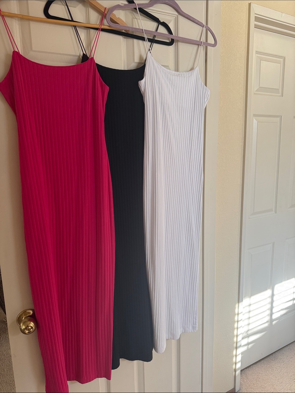 Three Zara Fuchsia, Black & White Ribbed Midi Slip Dresses.